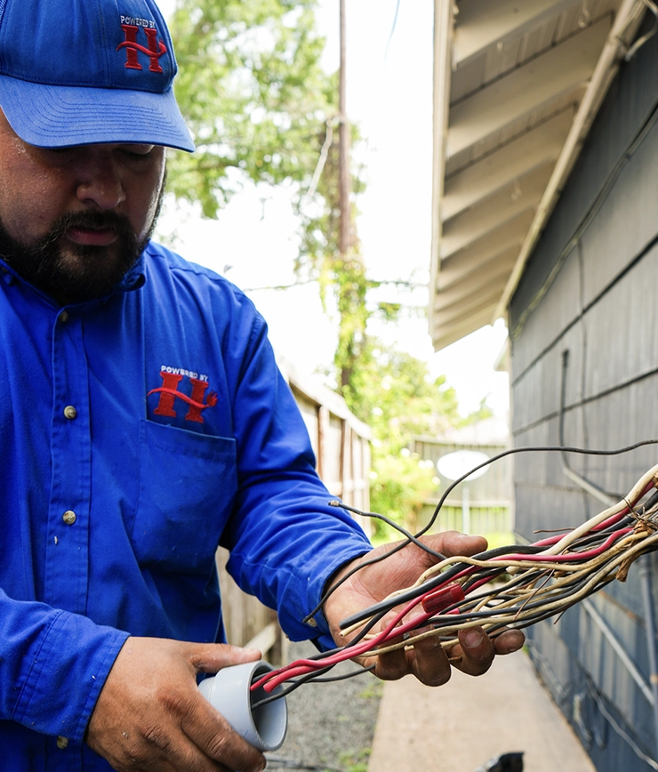 electrician-builder-with-beard-worker-white-helmet-work-installation-lamps-height-professional-overalls-with-drill-background-repair-site