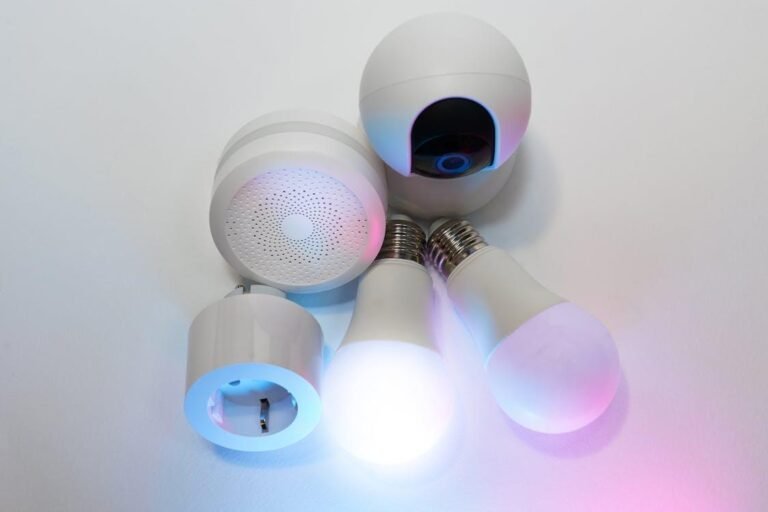 Smart lighting devices and LED bulbs arranged on a white surface