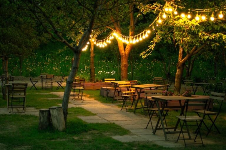 Houston backyard with layered landscape lighting highlighting seating