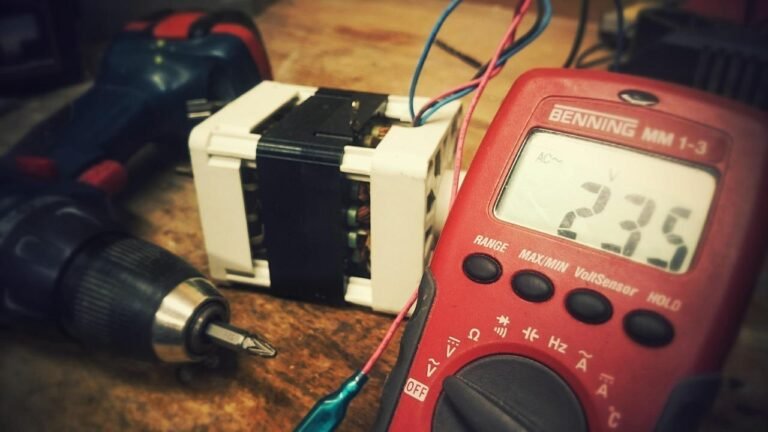 electrical wires connected to a digital voltage tester reading 235 volts
