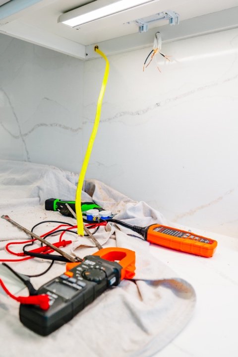 electrician planning wiring layout during home renovation