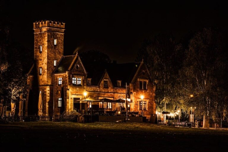 building illuminated with warm LED exterior lighting at night